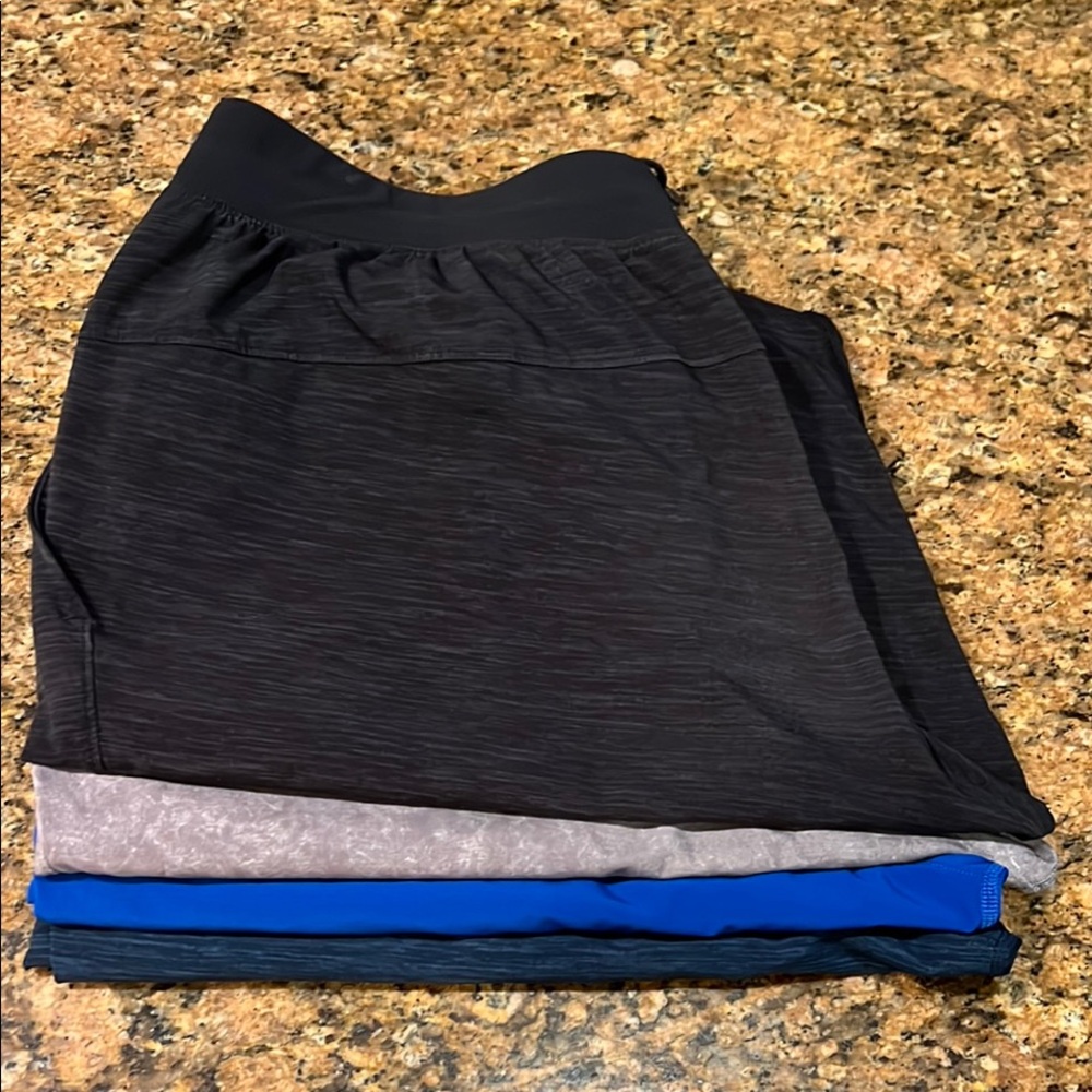 Lot of (4) Lululemon 9" liner-less shorts (L)